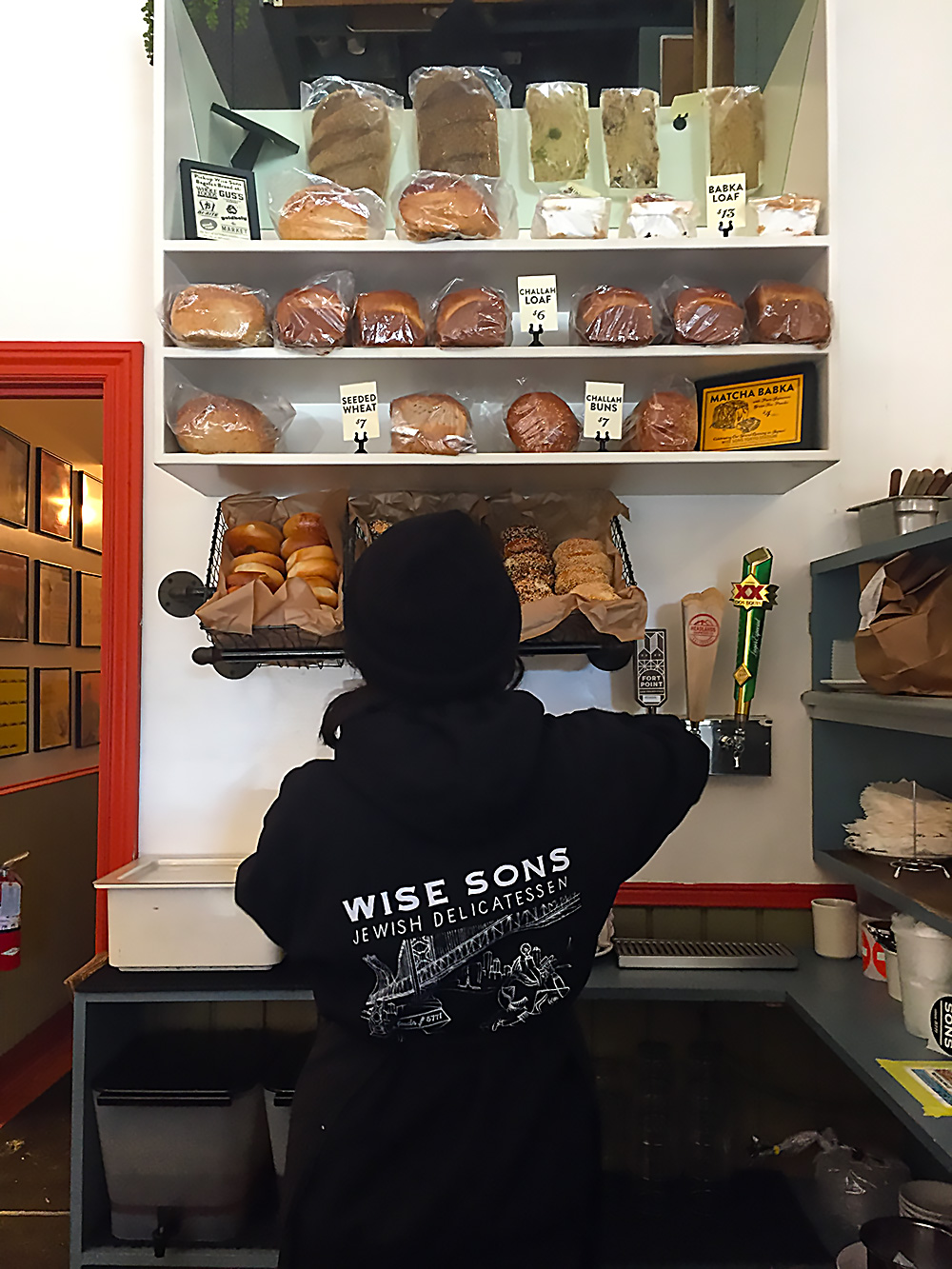 Bread display inside Wise Sons Deli on 24th Street - the rye bread is on the top left.