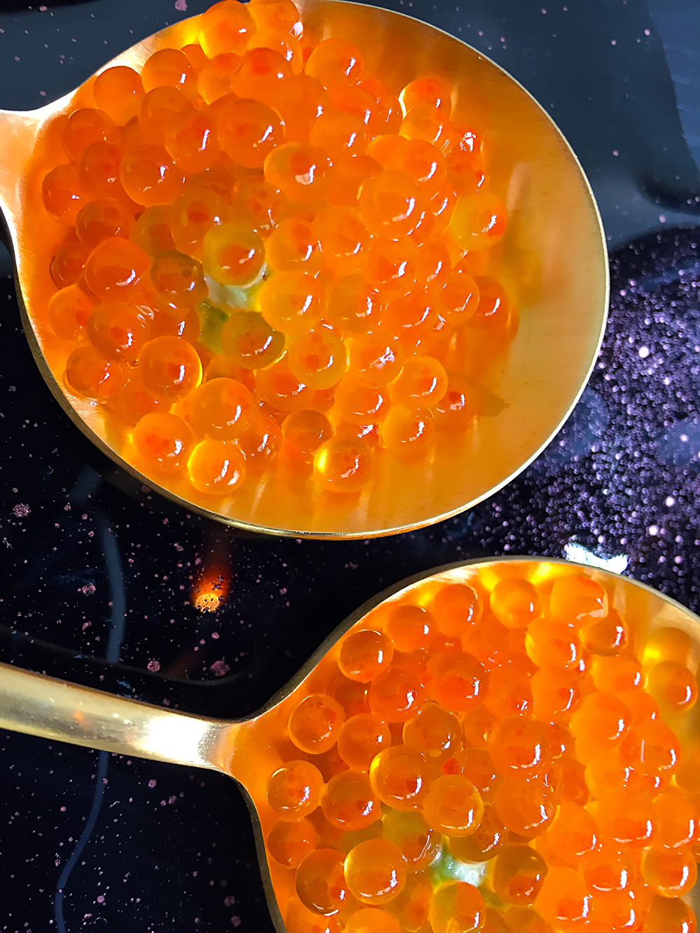 Smoked trout roe hiding an aioli-like concoction made of whipped avocado and sesame