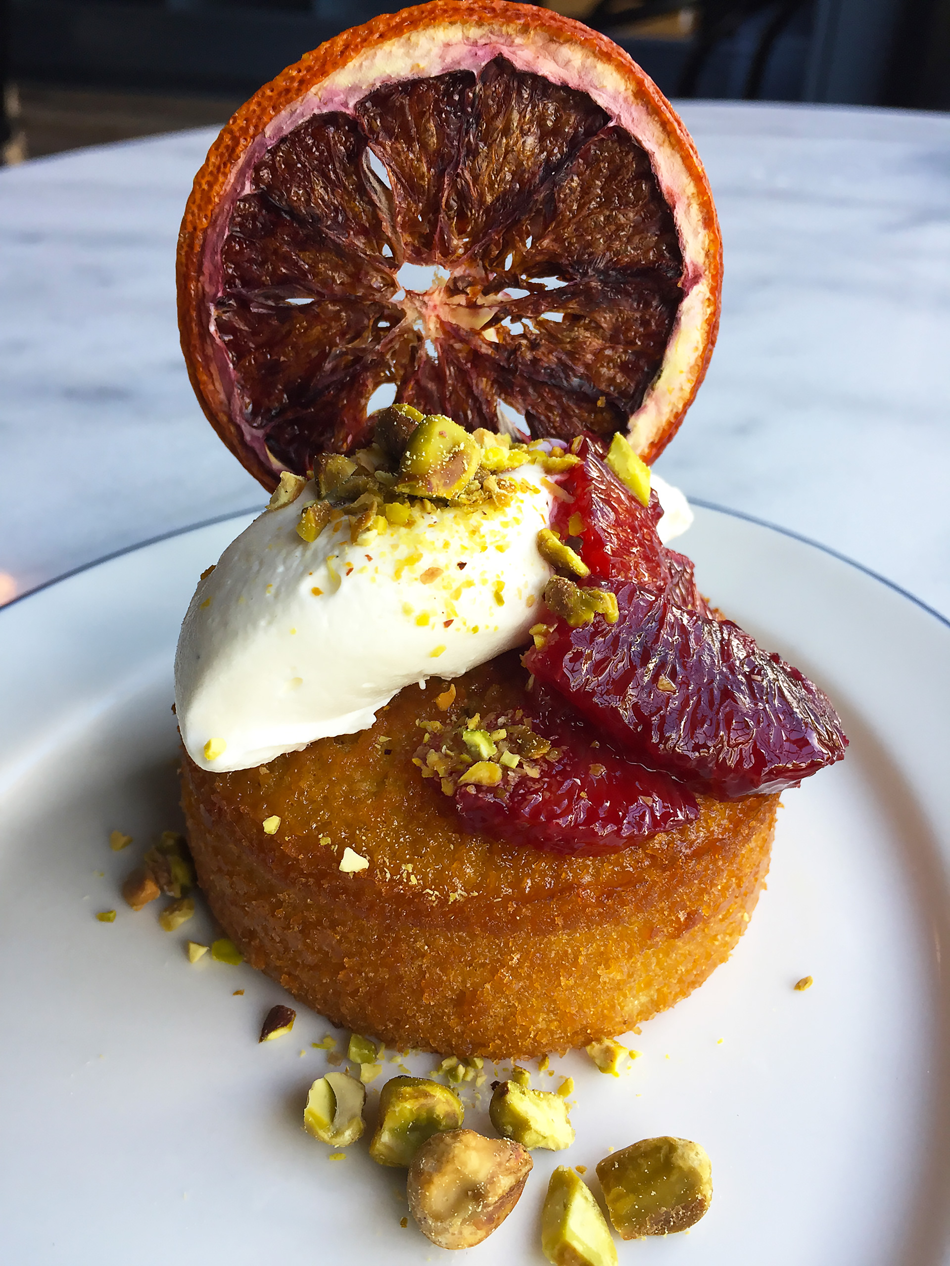 Olive oil cake with blood oranges and pistachios