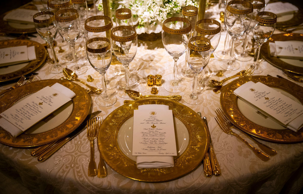Dinner china is set for the first state visit of the Trump administration, in the State Dining Room of the White House on Monday.