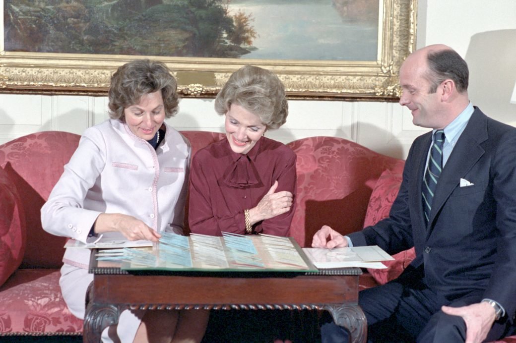 First lady Nancy Reagan reviews plans for the administration's first state dinner in February 1981.
