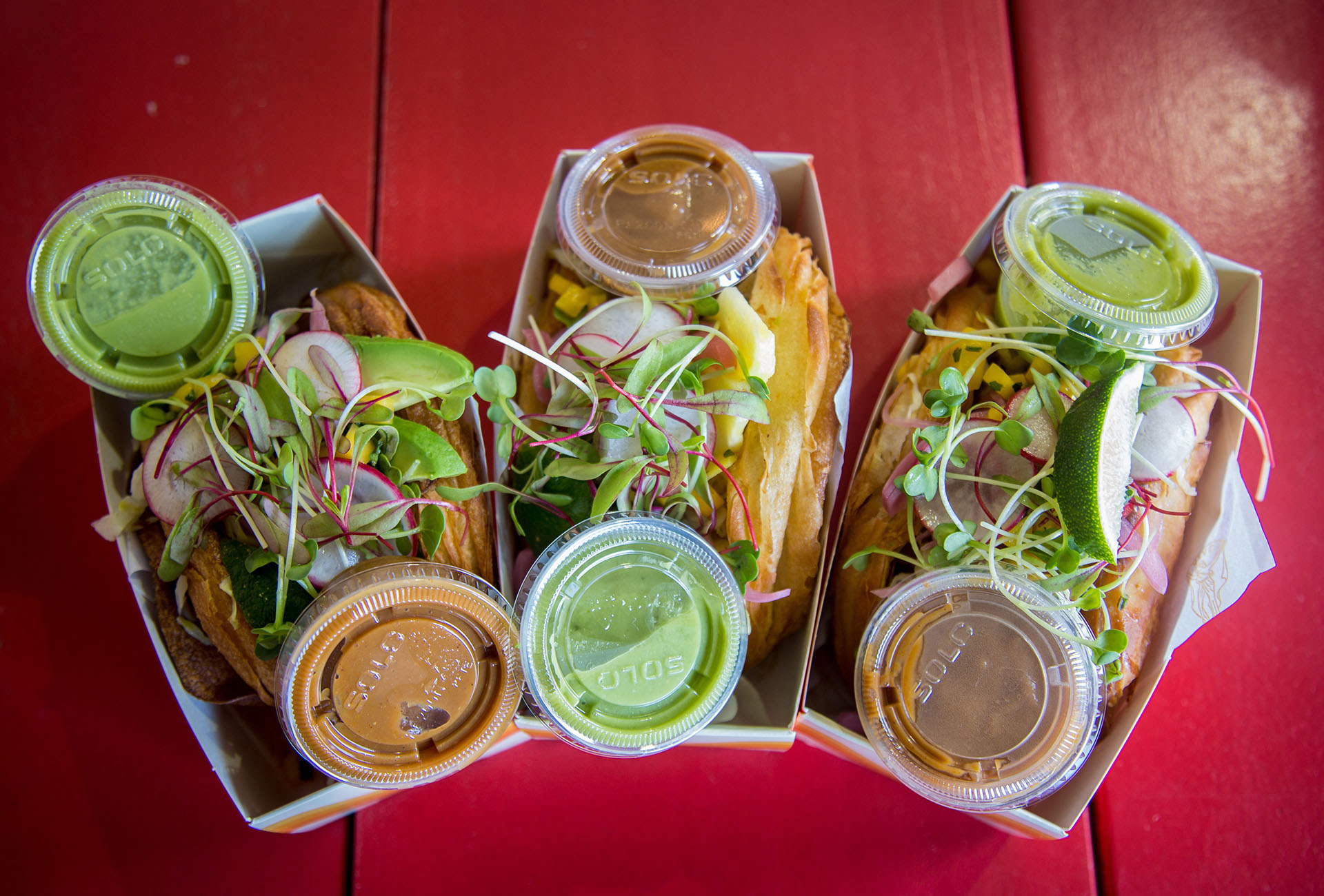 All three varieties of the Tacro including the Jackfruit BBQ, Chicken and Avocado, and Pulled Pork and Pineapple.