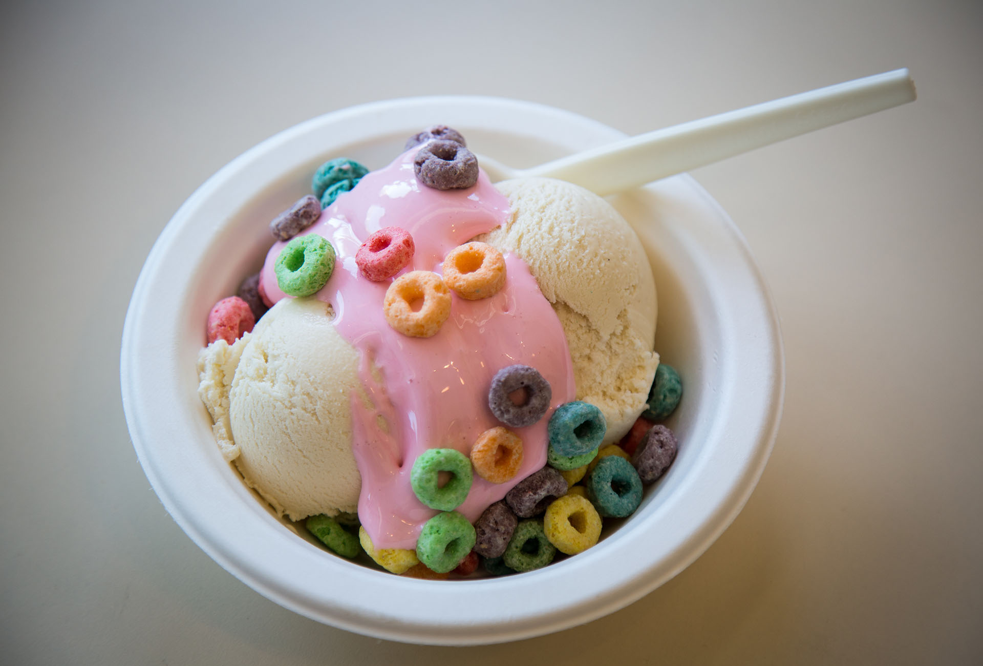 The Make It Gay Sundae, made with your choice of ice cream, house-made pink marshmallow fluff, and Fruit Loops.