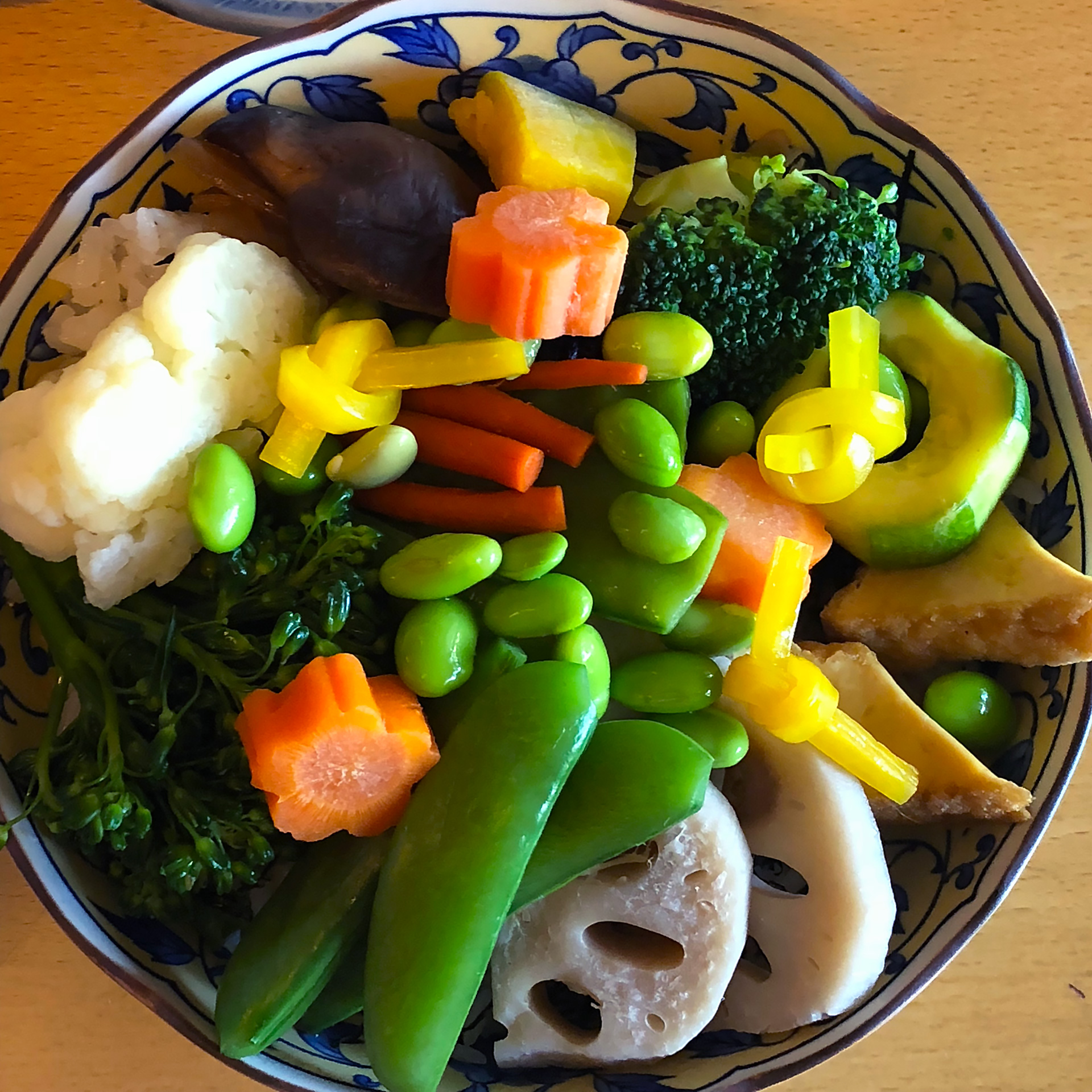 Hana Gomoku: Seasoned sushi rice bowl. Shiitake, green beans, carrots, lotus root, tofu puch, yam cake, hijiki. ($13)