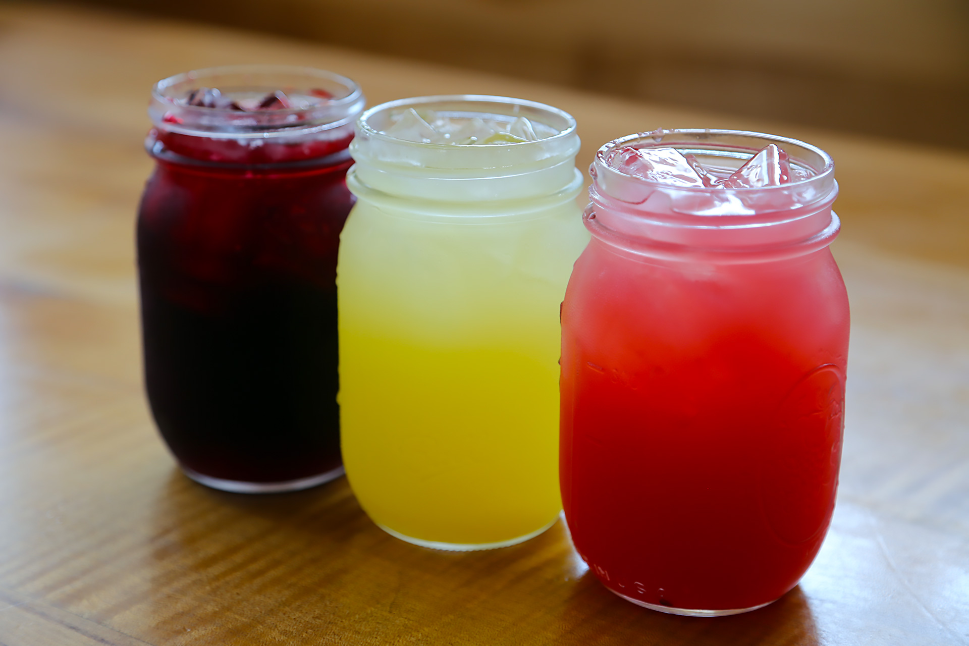 Agua frescas are housemade: jimica (hibiscus), pineapple and watermelon.