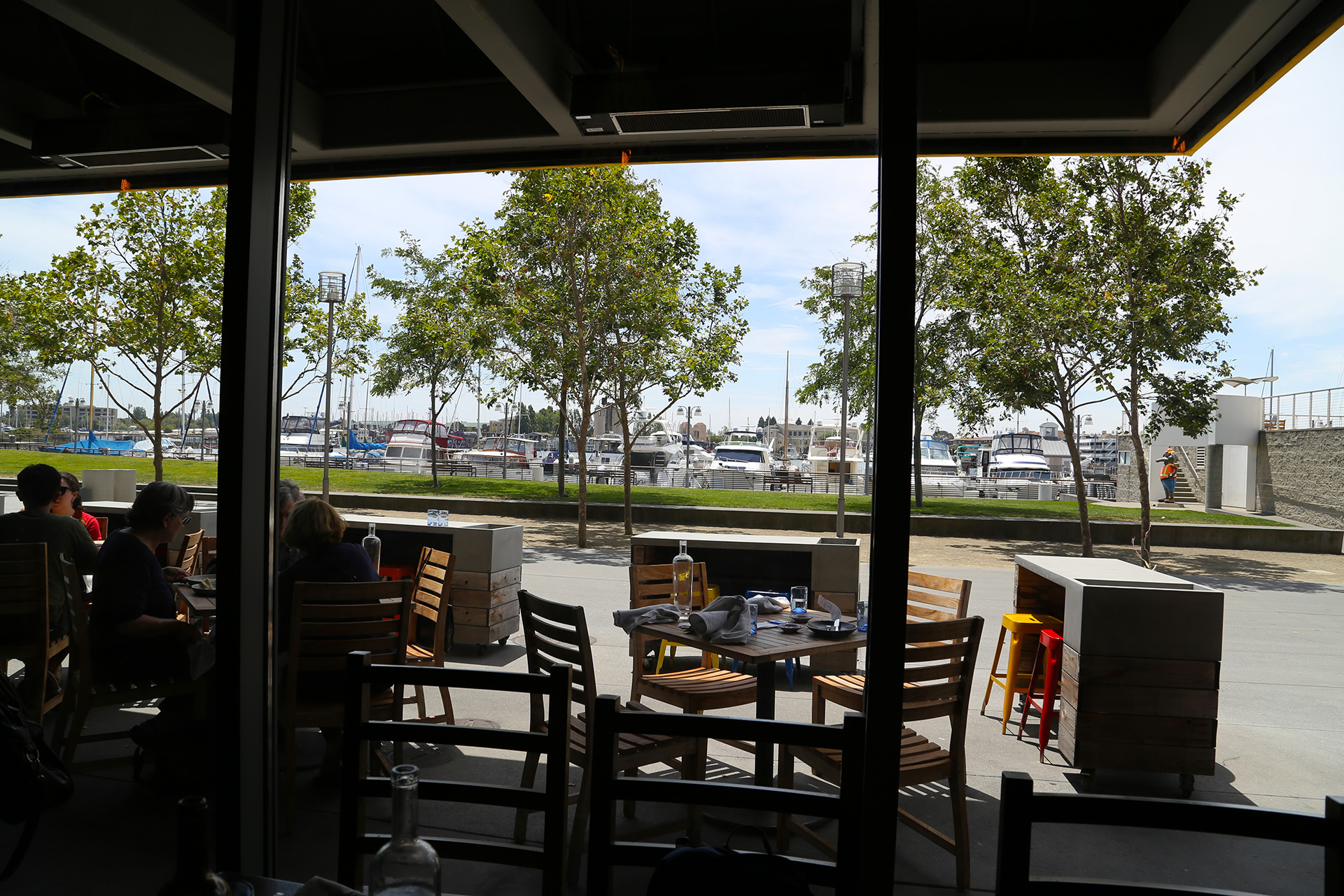 View of outdoor patio and Oakland Estuary in Jack London Square.