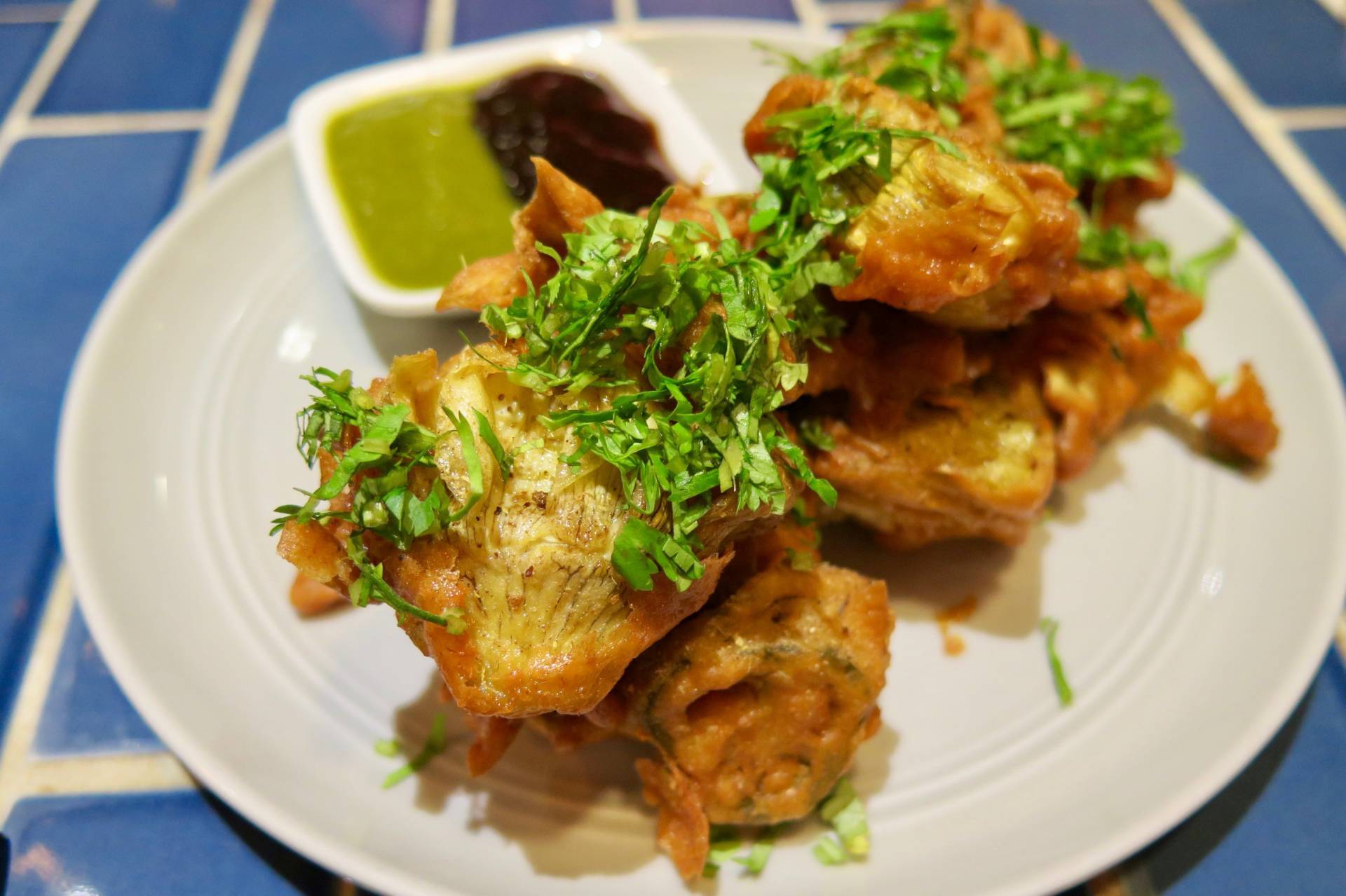 The artichoke pakoras are a great place to start.