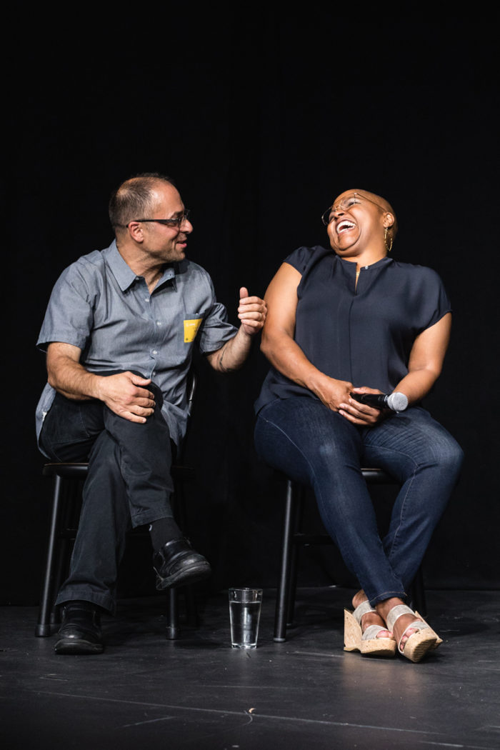 Sam Mogannam and Tanya Holland laugh during the Airbnb event.