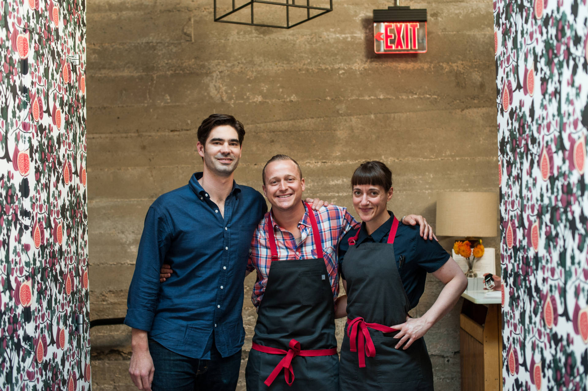 Angela Pinkerton with her restaurant partners, David Nayfeld and Matthew Brewer.