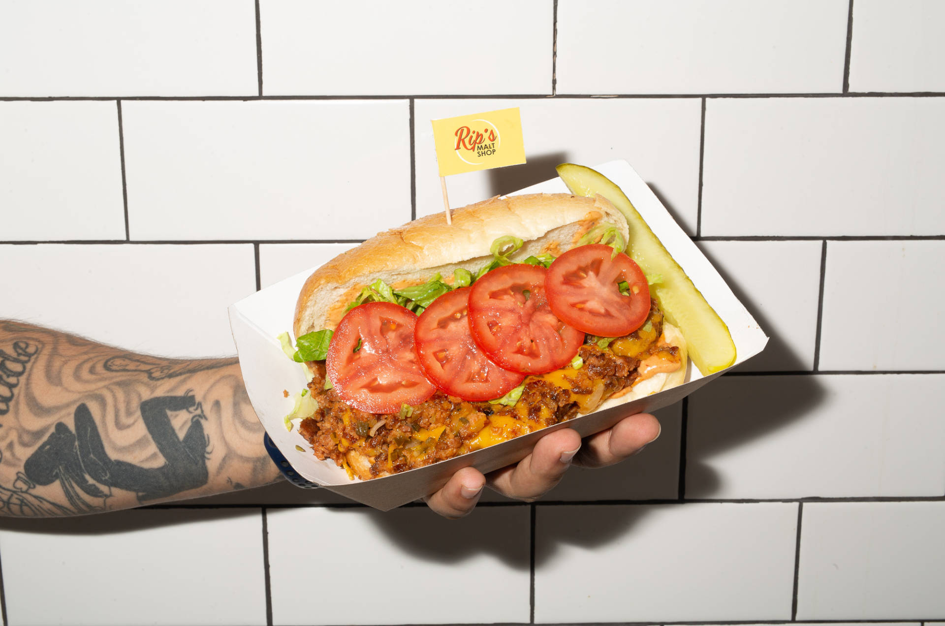 The vegan chopped cheese sandwich is a popular item at Rip's. Instead of ground beef, it's made with diced a Beyond Meat burger and dairy-free Daiya cheese.