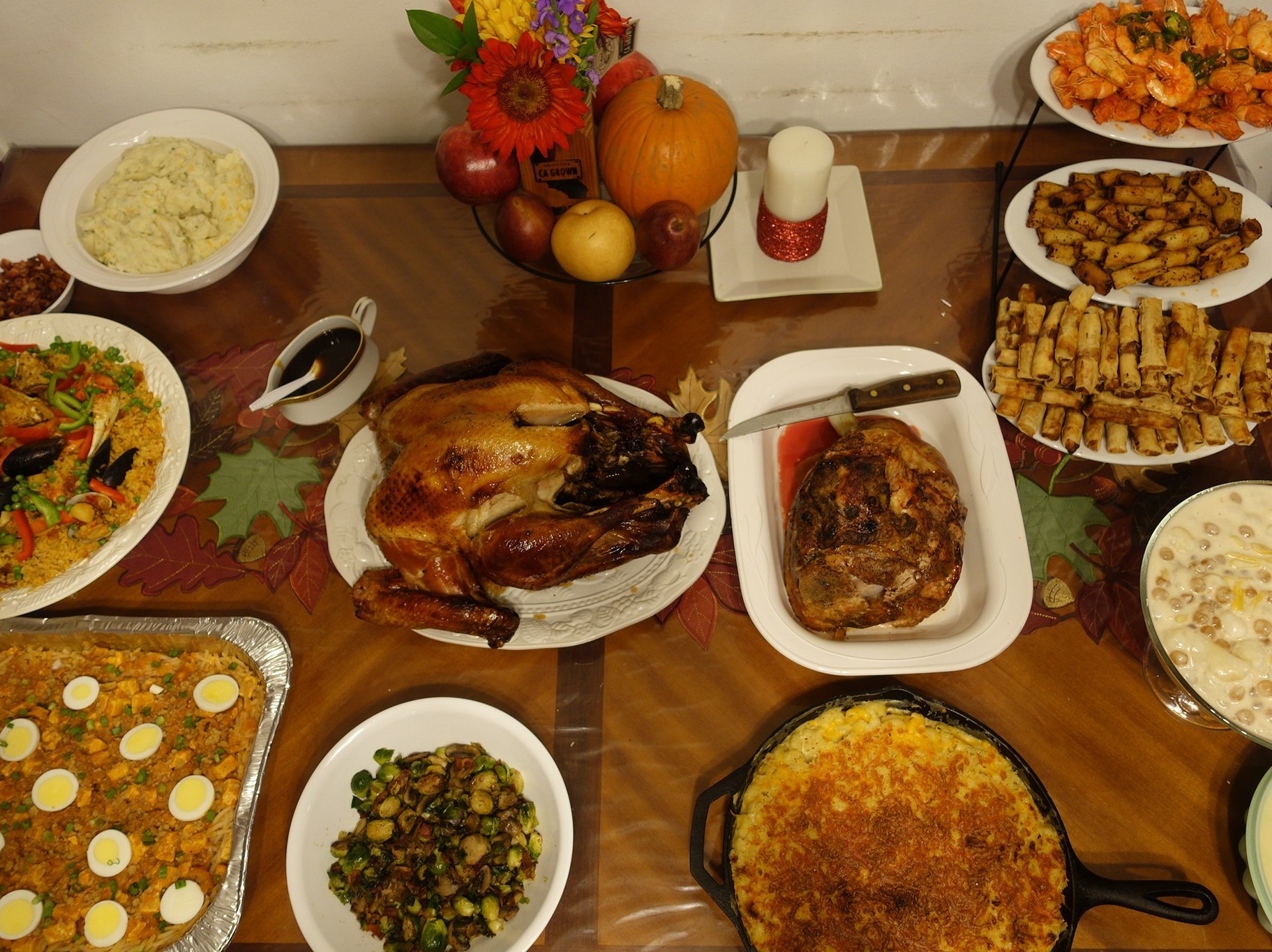 PJ Policarpio's Thanksgiving spread, last year. The feast includes Filipino paella, a noodle dish called palabok and lumpia, fried egg rolls.
