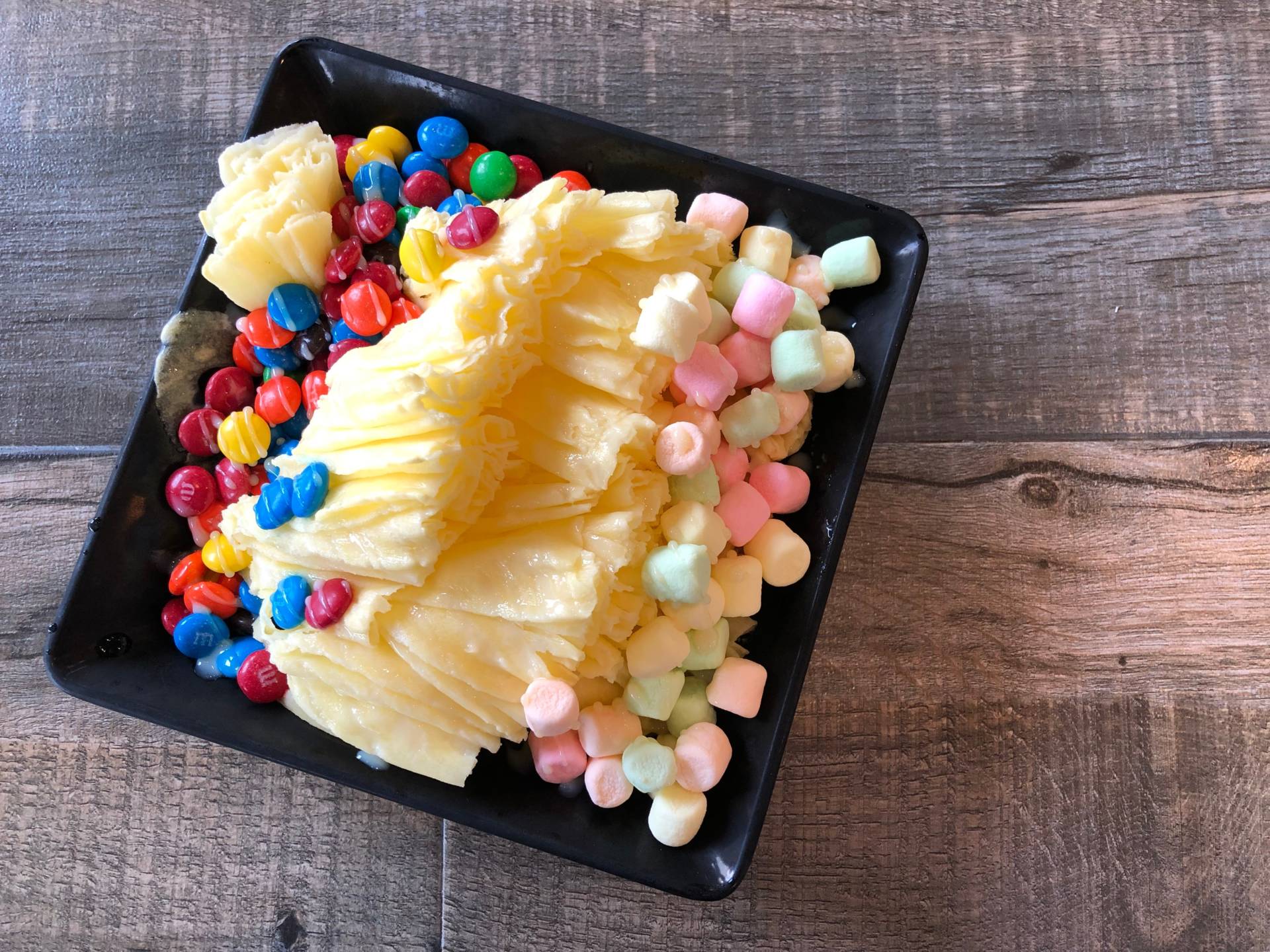 Friends with a meg-sweet tooth will love meeting up at Creme Brewlee for a shaved snow, pictured here.