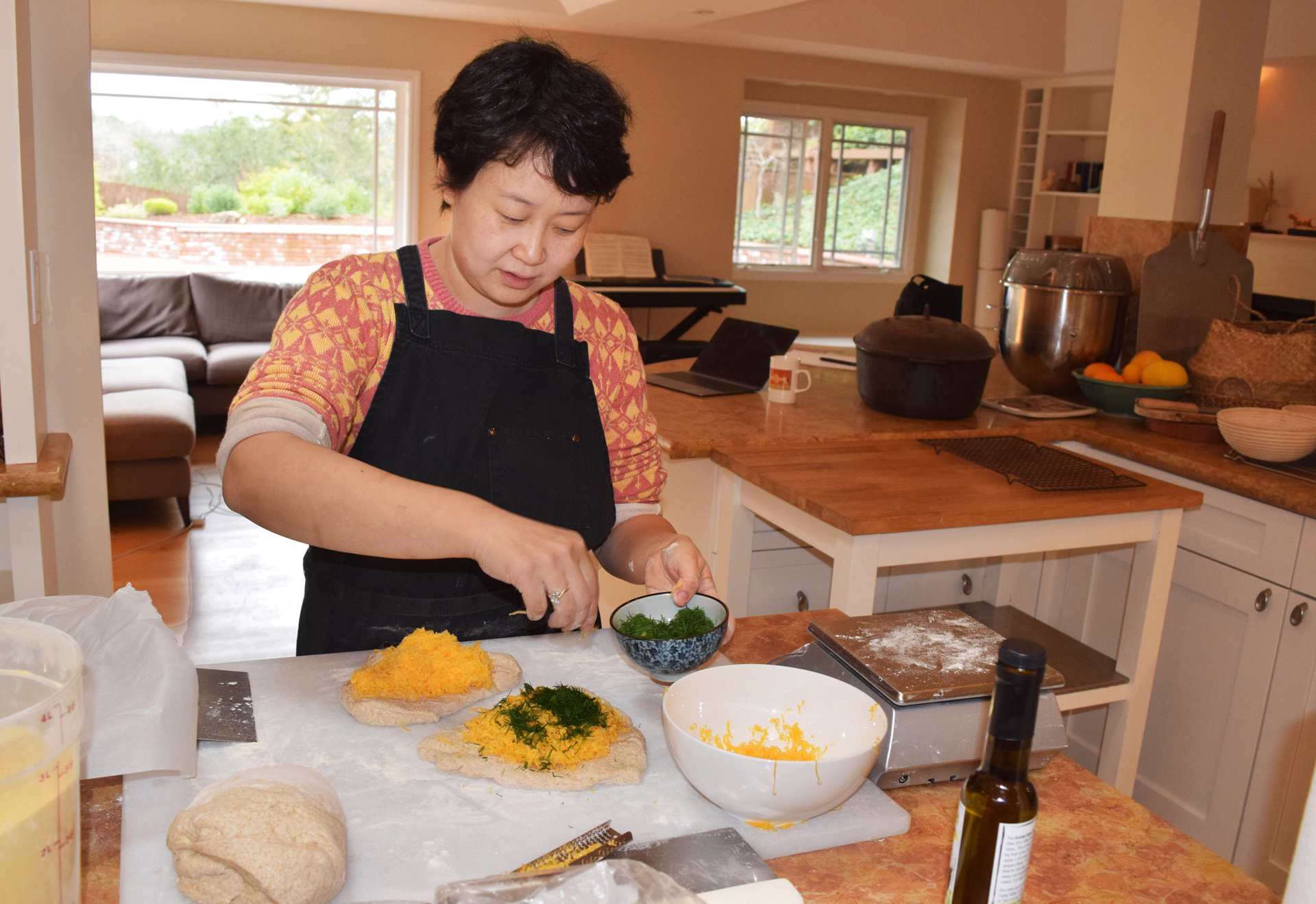 Bakery founder Tian Mayimin makes a wide variety of naturally leavened breads in her kitchen in Menlo Park, such as yummy, cheese-filled rolls.