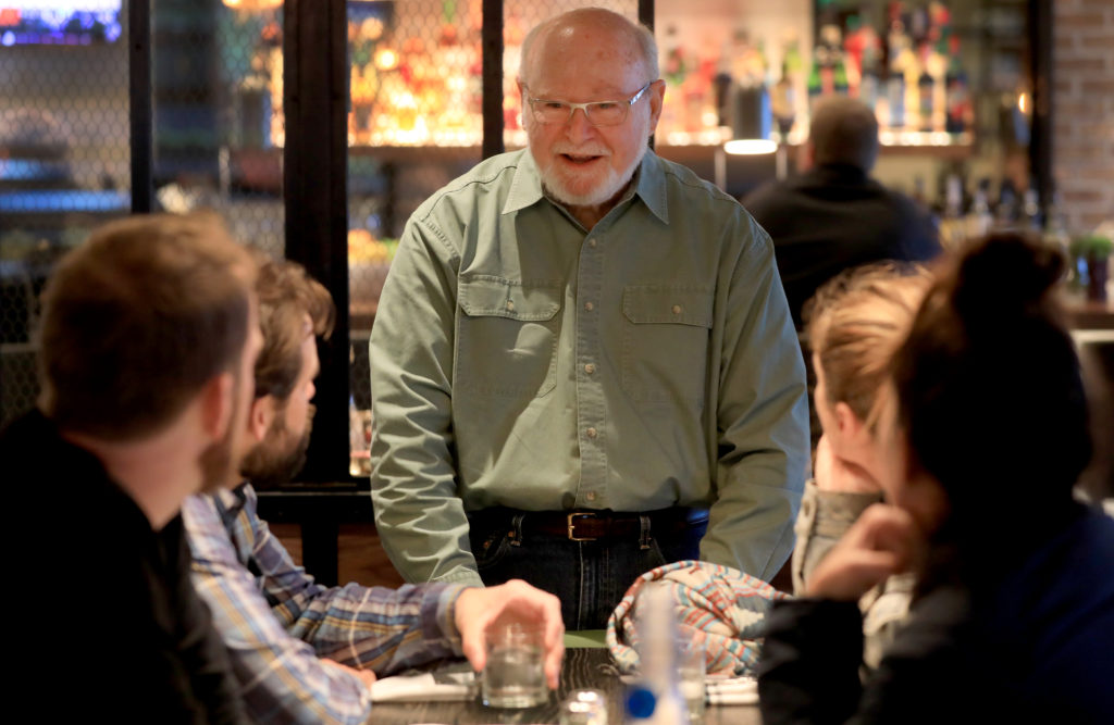 Sweet T's owner Dennis Tussey talks with customers, Monday, March 4, 2019 during a soft opening of the restaurant's new location in Windsor.