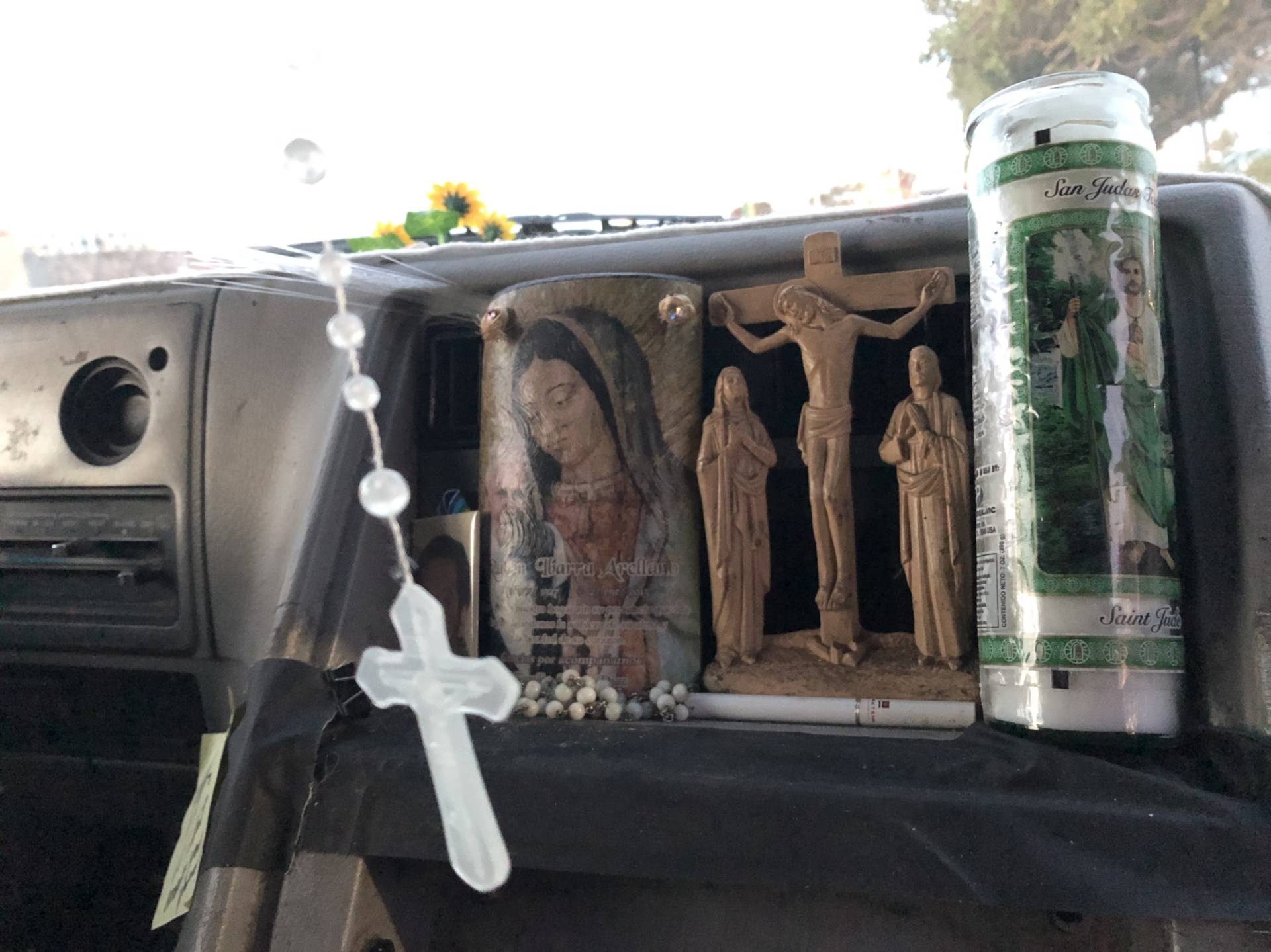 Armando Ibarra, a hotel restaurant worker in San Francisco, lives out of his van to save money — and to avoid an hours-long commute from San Jose. A holy candle rests on his dashboard; a rosary hangs from the rearview mirror.
