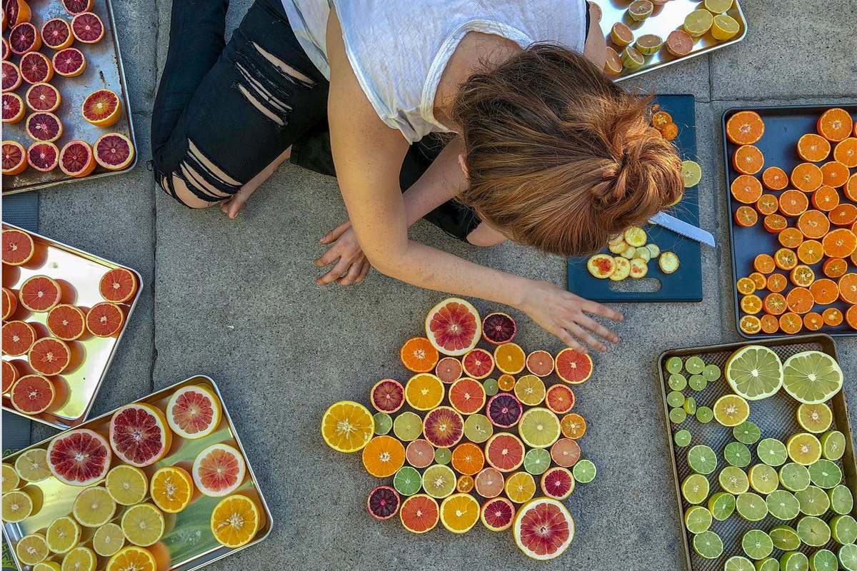 Aliza Sokolow arranges some citrus.