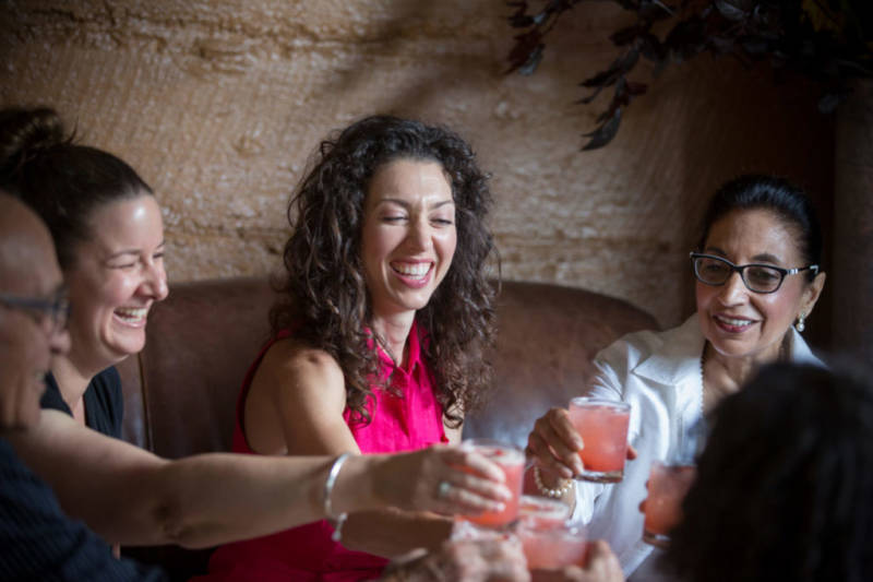 Danielle Alvarez, center, toasts to friends and family during a special dinner menu at Mateo's Cocina Latina in Healdsburg, Calif. Saturday, June 25, 2016. Mateo's Cocina Latina is beginning to offer sustainable feasts that include every part of the animals butchered for the dinner, including suckling pig brain mousse and pigs tails