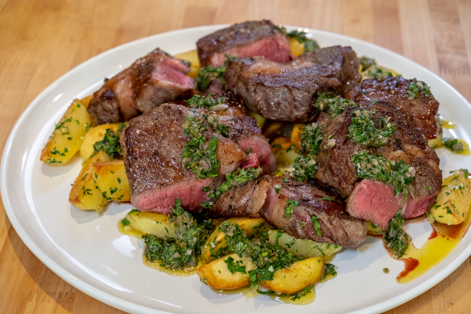 Traci Des Jardins's grilled ribeye with duck fat potatoes and salsa verde.