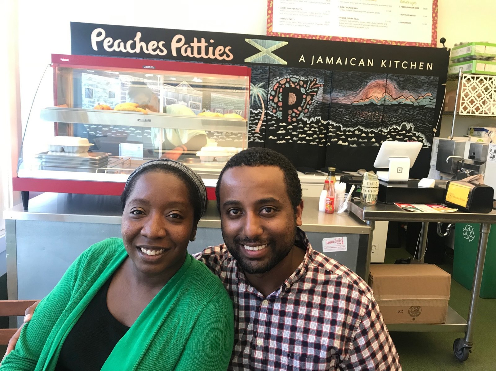 Shani Jones and her husband, Yeheyis Bedada, sell Jamaican patties at their kiosk in San Francisco's Bernal Heights neighborhood.