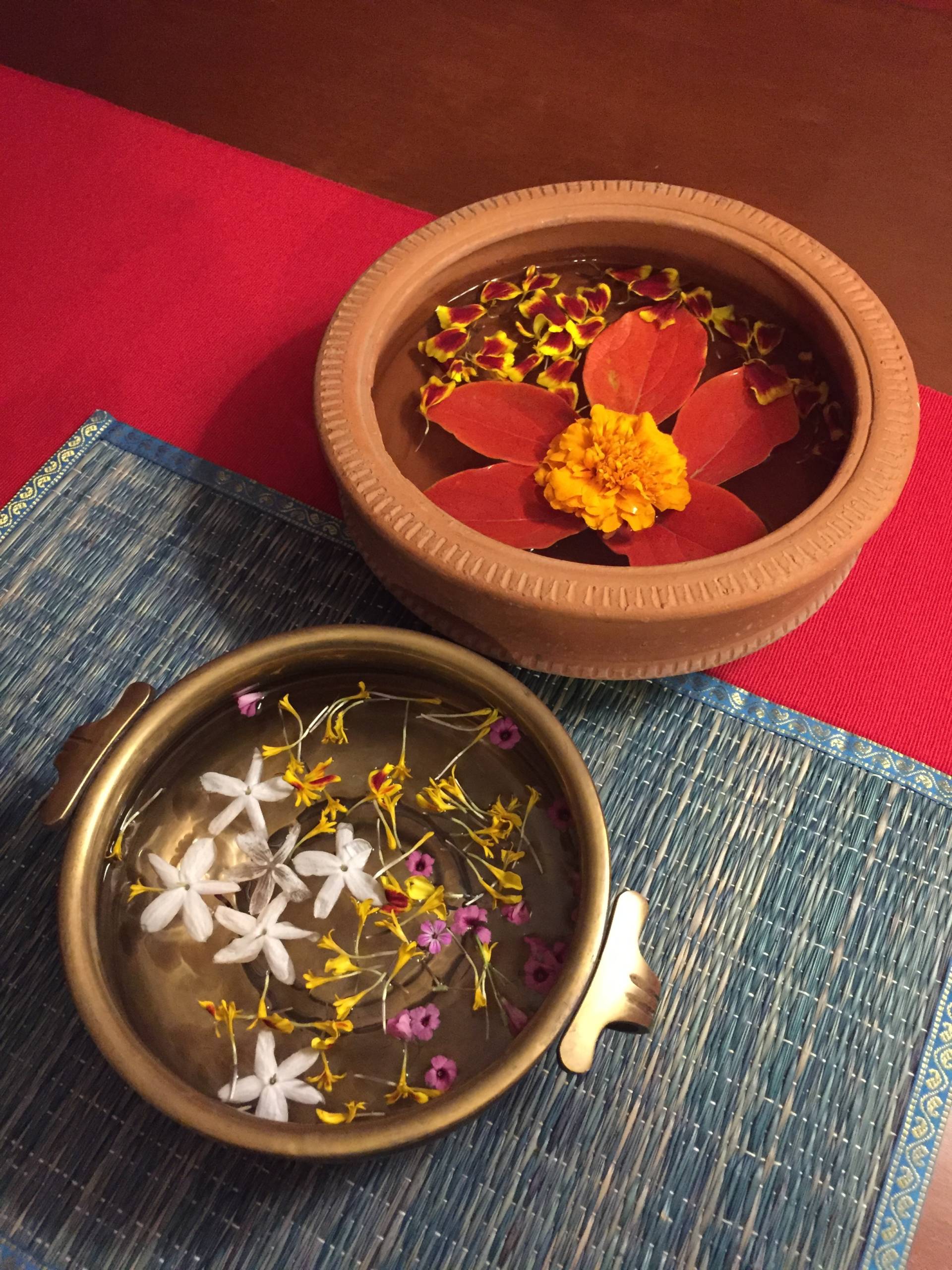 Kali Puja dinner table decor features California fall colors and local flowers including sorrel.