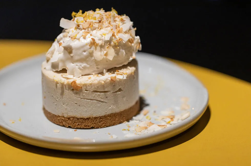 Meyer lemon agave cheesecake with a gluten-free graham cracker crust and whips of coconut.