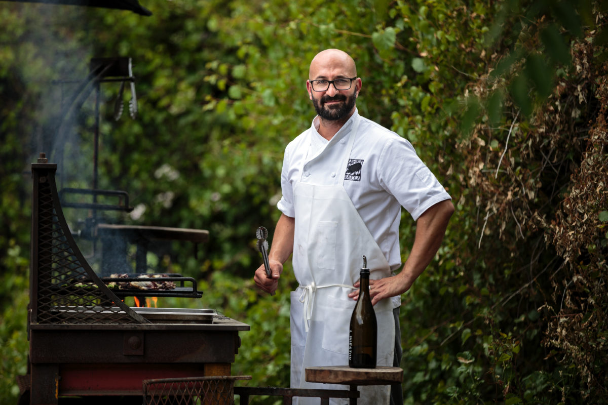 Dino Bugica, chef/owner of Diavola grilling vegetables