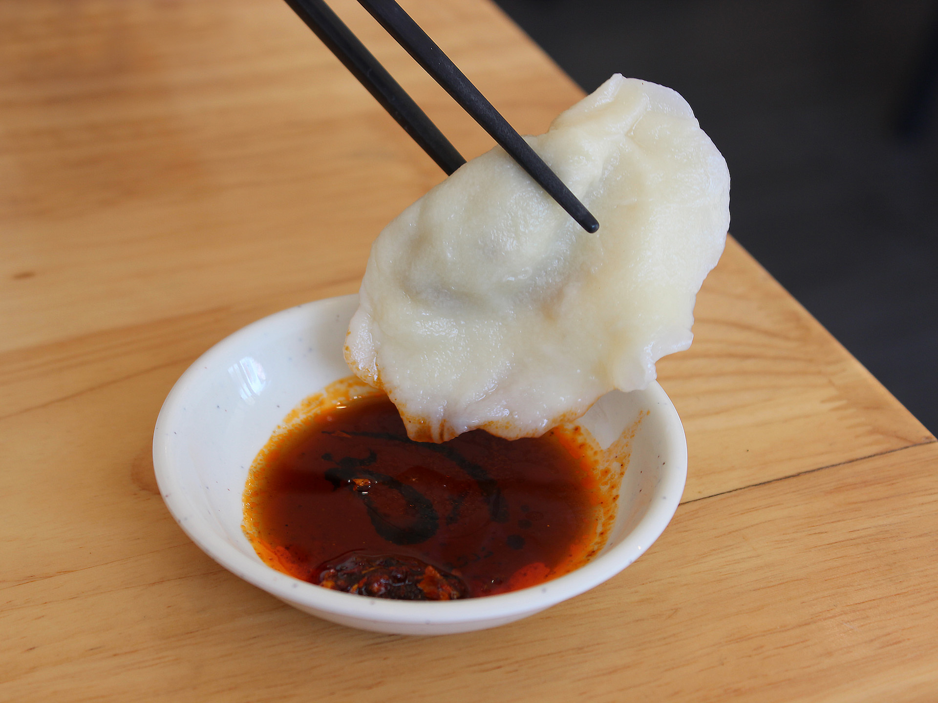 The boiled Northern Chinese dumplings at Yuanbao Jiaozi are made in front of your eyes.