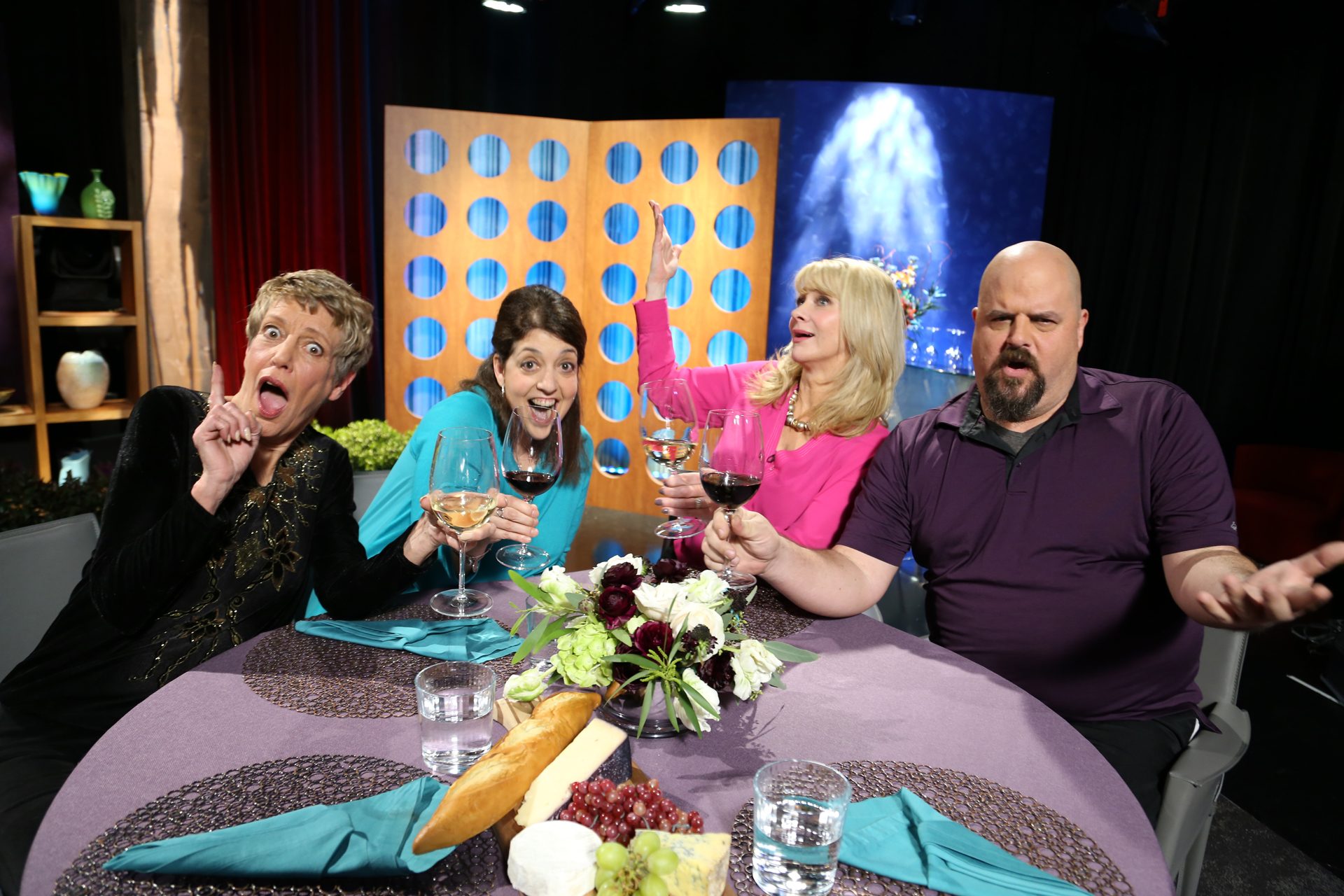 Host Leslie Sbrocco and guests having fun on the set of the premiere episode of season 12.