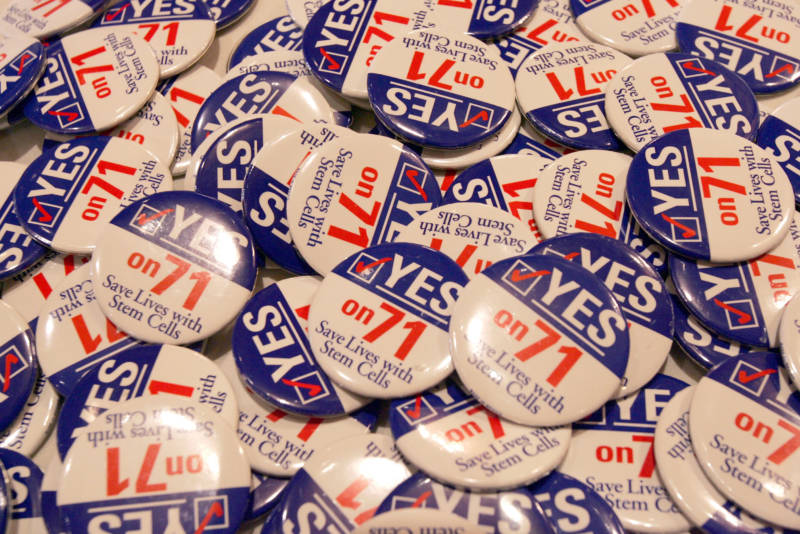 Buttons with the slogan 'Save Lives With Stem Cells,' in support of Prop. 71 at the Stem Cell Research Proposition Party at the Biltmore Hotel Nov. 2, 2004 in Los Angeles, California.