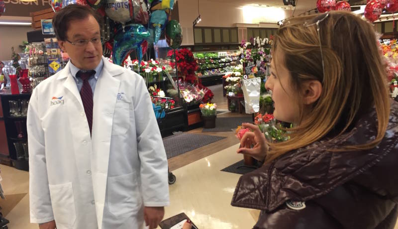 Dr. Daniel Nadeau gives Allison Scott a few tips on getting kids to eat healthy, at Ralph's Supermarket in Huntington Beach.