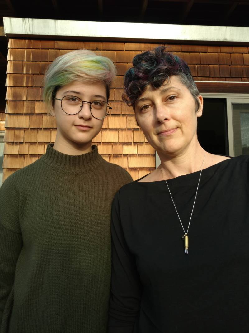 Cypress, 14, who identifies as gender fluid, with her mother, Christine Chrisman. ". I’ve never really felt all the way over on one side of the spectrum," Cypress says.