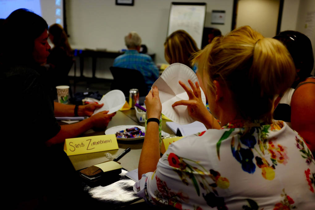 Teachers at the Crooked River Math Teachers' Circle grapple with a problem during a week-long summer institute.