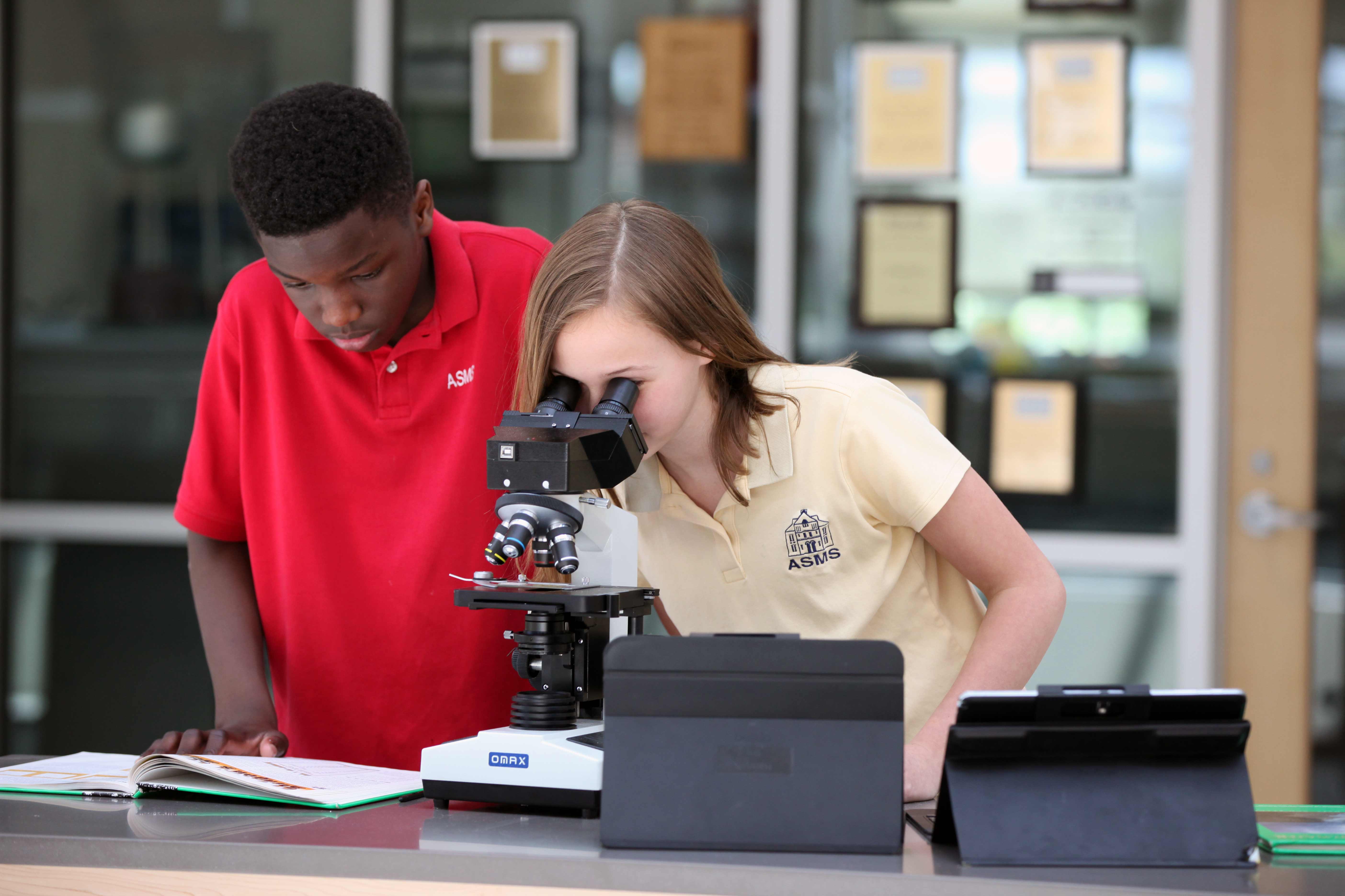 The science curriculum at ASMS encourages students to work collaboratively to solve the road blocks that real scientists face when developing experiments.