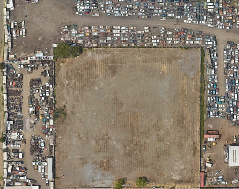 Satellite imagery showing Deal Auto Wrecking before the fire.