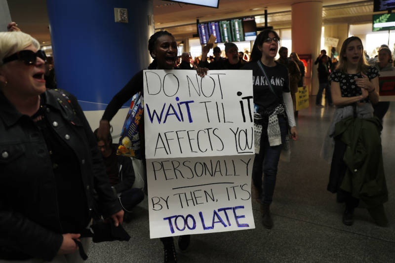 SAN FRANCISCO, CA - JANUARY 28: Demonstrators march into the international arrival area during a rally against muslim immigration ban at San Francisco International Airport on January 28, 2017 in San Francisco, California. President Donald Trump signed an executive order Friday that suspends entry of all refugees for 120 days, indefinitely suspends the entries of all Syrian refugees, as well as barring entries from seven predominantly Muslim countries from entering for 90 days. (Photo by Stephen Lam/Getty Images)