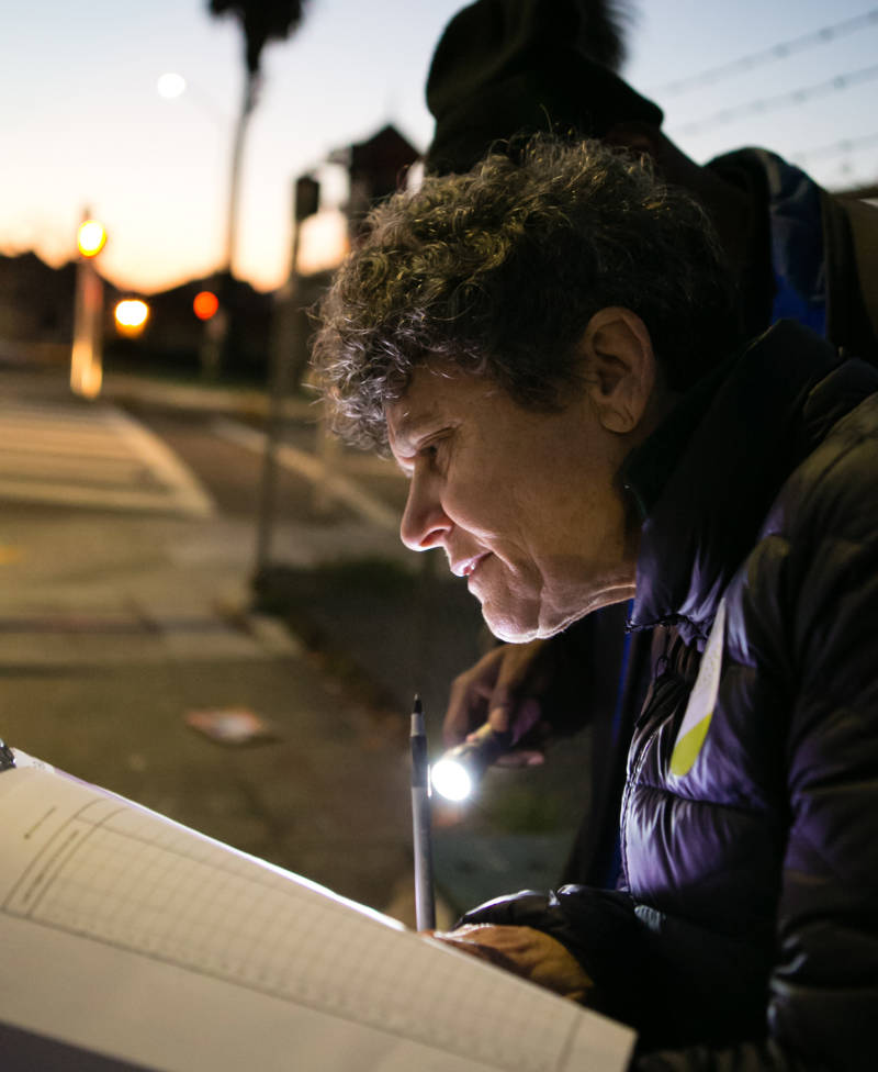 Brenda Goldstein of El Cerrito fills out survey forms during the Alameda County Point-In-Time homeless survey on Jan. 31, 2017.