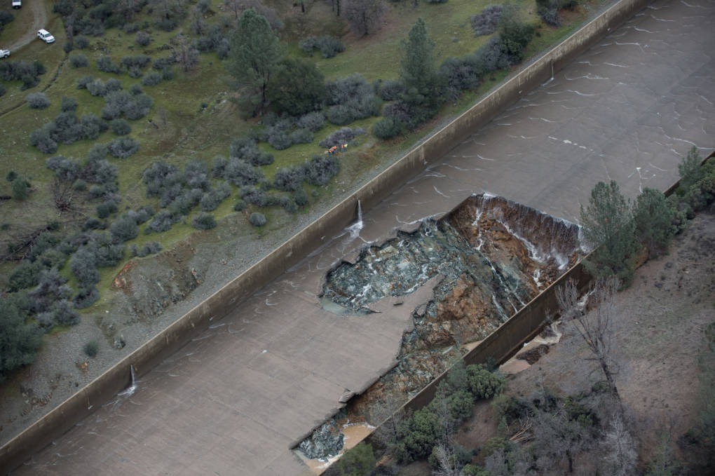 California Department of Water Resources photos taken Tuesday, Feb. 7, 2017, show extensive damage to the Oroville Dam spillway and severe erosion to area adjacent to spillway structure.