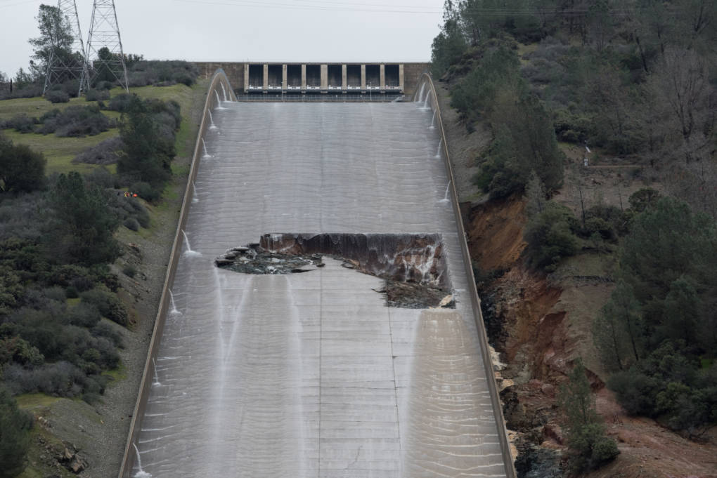 The California Department of Water Resources has suspended flows from the Oroville Dam spillway after a concrete section eroded on the middle section of the spillway. Kelly M. Grow/ California Department of Water Resources