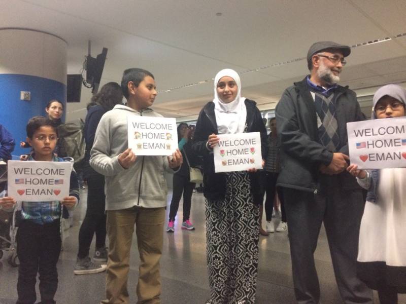 Family of Eman Ali, 12, wait for her at SFO. She'd been stranded by Trump's travel ban.