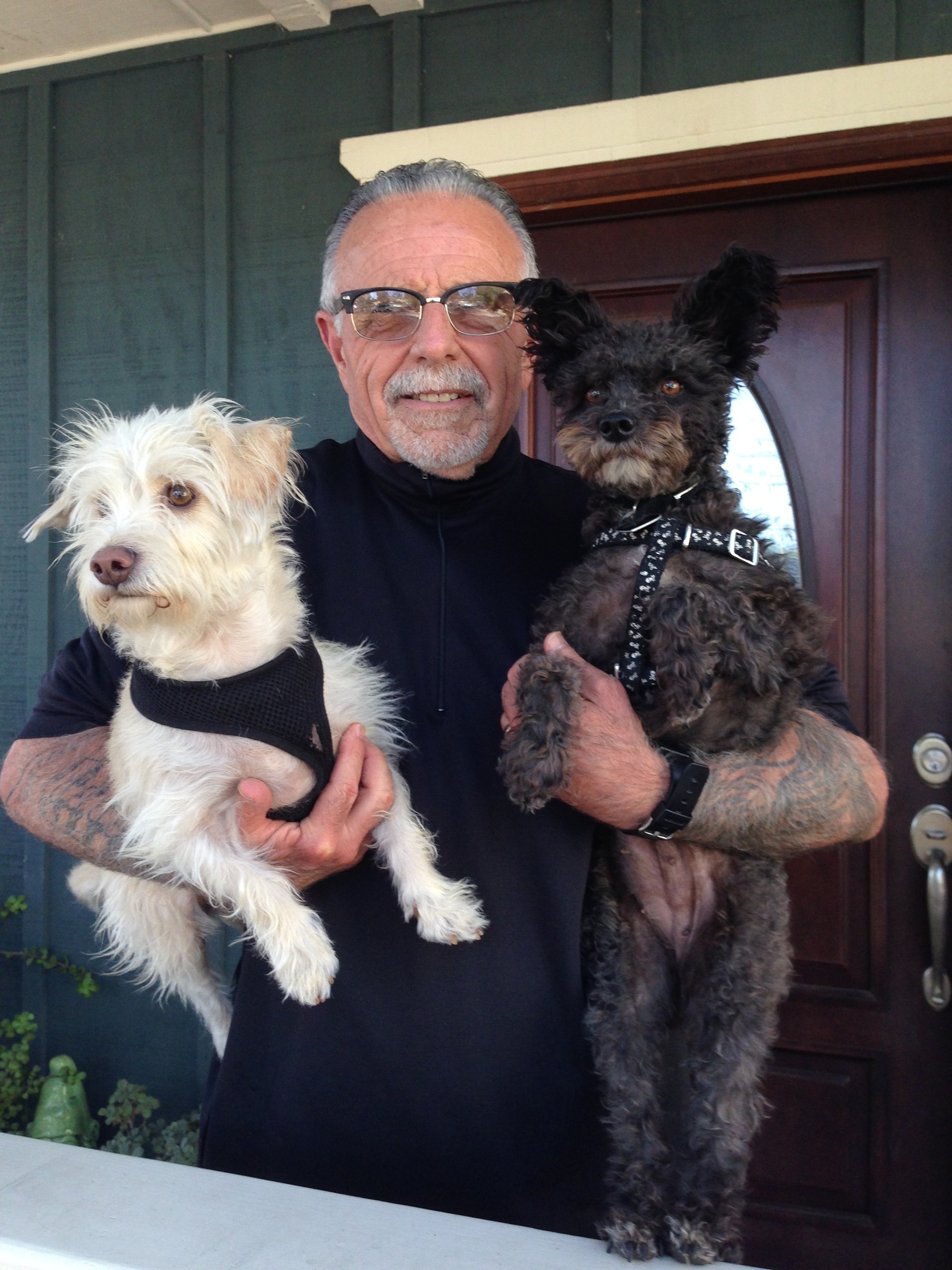 Former Hells Angel George Christie on his Ojai front porch with dogs Mr. Scruffy (L) and Lulu.