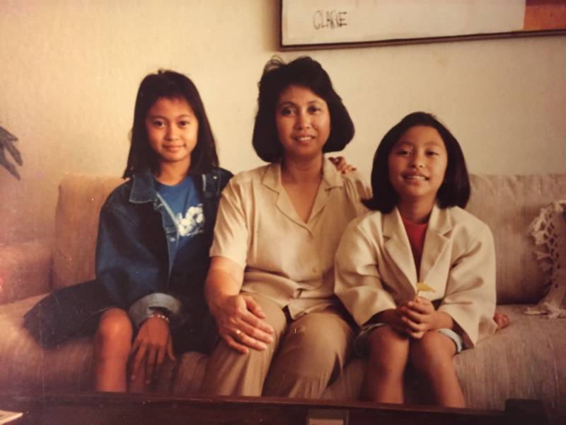 Janet del Mundo, far right, with her mom and sister in 1987. Del Mundo's grandfather fought for the U.S. in WW2, earning him U.S. citizenship. He was able to petition for his children, including del Mundo's mom.