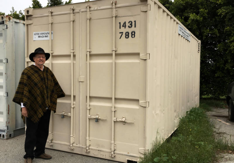 Rev. Fred Morris stands outside a container filled with 600 blankets in the parking lot of the North Hills United Methodist Church in the San Fernando Valley. He says his church is ready to provide sanctuary to immigrants who fear deportation and do not feel safe at home.