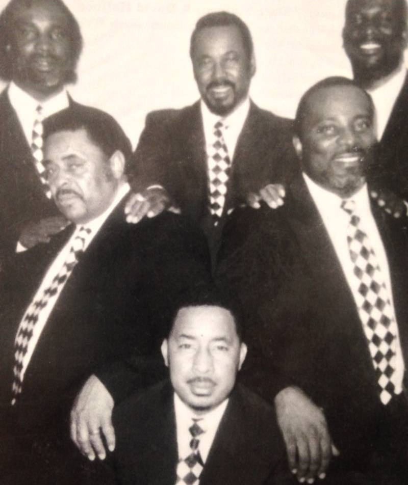 An archival photo of some of The Supreme Jubilees. Leonard Sanders is at top left.