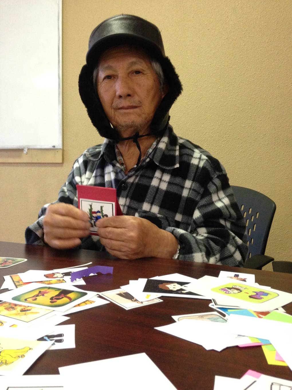 Vong Vang Xiong fought in Laos for six years in the CIA's Secret War. He does group crafts to help deal with depression.