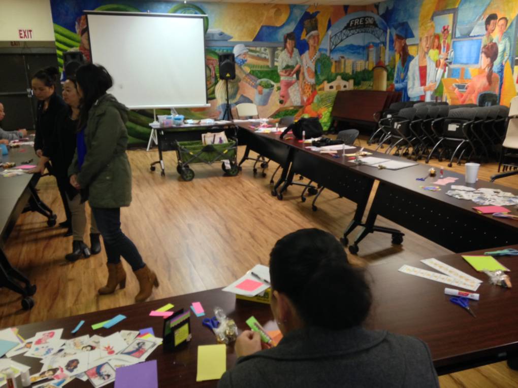 Counselors at the Center for New Americans lead group activities with clients suffering from depression. The clients chose not to be in the picture. 