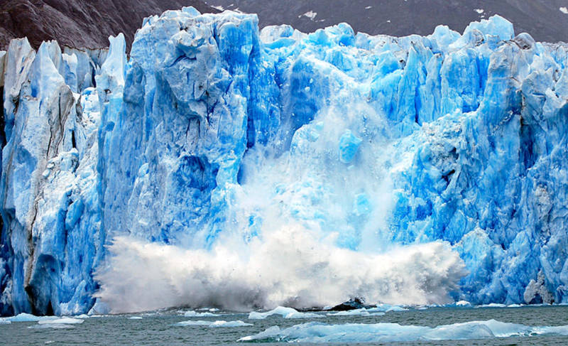 A melting glacier calving.