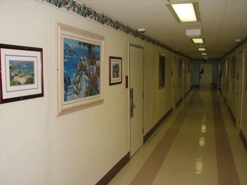 Recent photo of a hallway in Fairview Developmental Center.