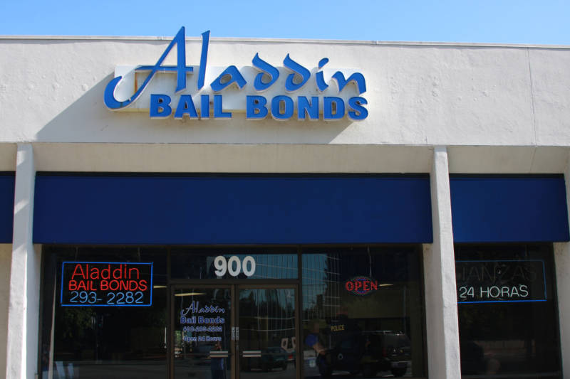 Aladdin Bail Bonds was one of seven companies whose agents were arrested for illegal business practices including "bail capping."