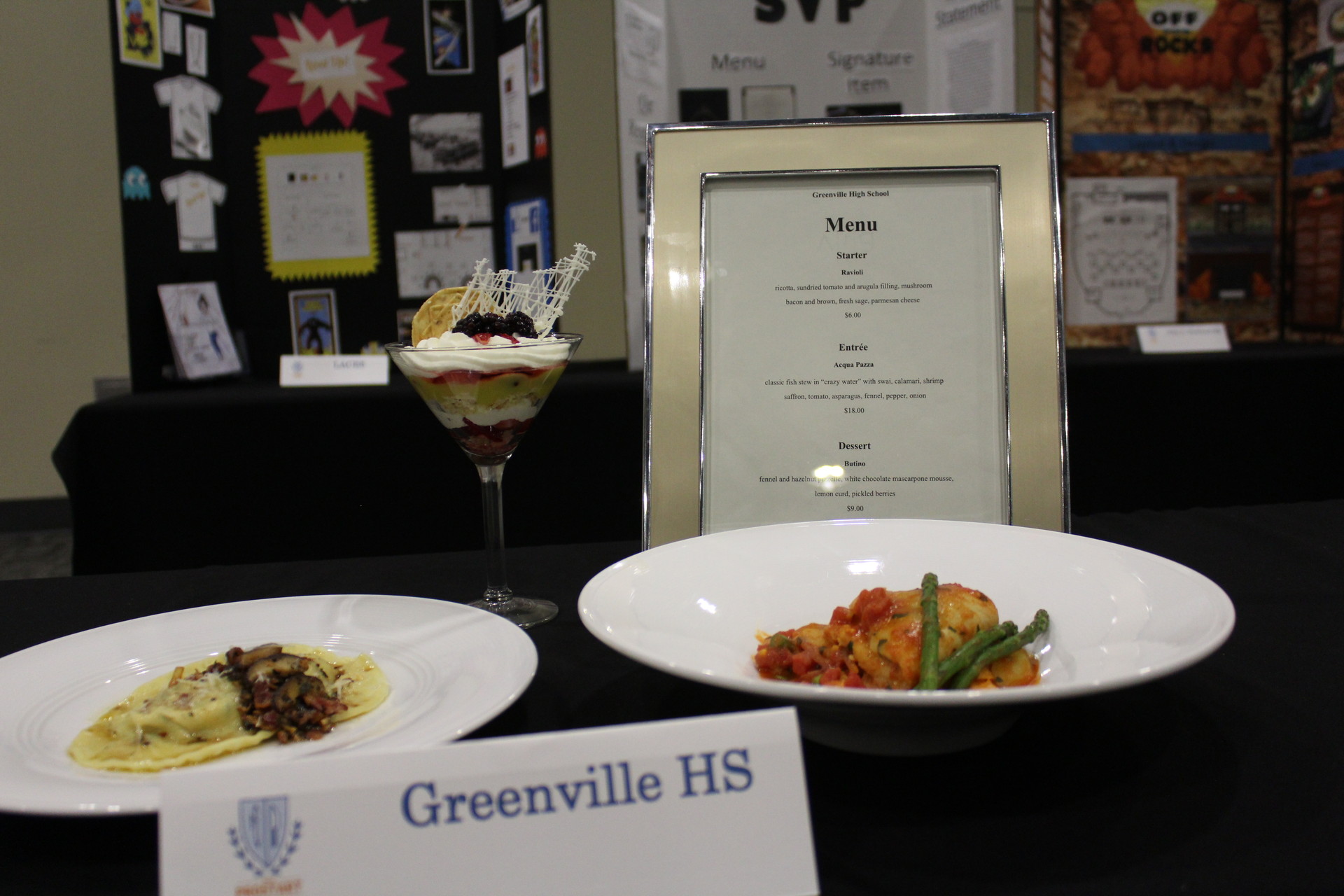 The winning dishes from Greenville High: ravioli in a brown butter sauce with sage, bacon, and shitake mushrooms; All’Acqua Pazza (fish in broth); and a parfait with lemon curd, pickled berries, fennel and a cookie.