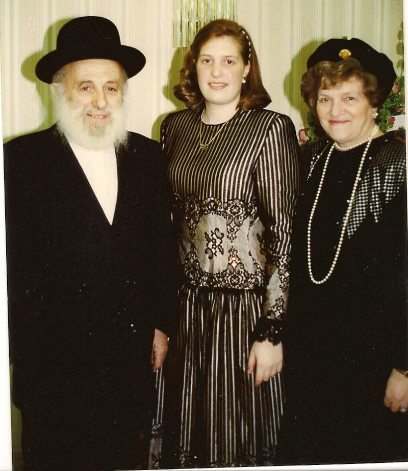 Henny Kupferstein, age 18, with her paternal grandparents on her engagement day.